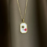Collana girasole + cuoricino