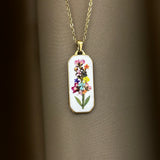 Collana arcobaleno di fiori