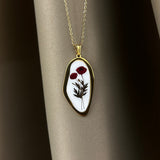 Collana Papaveri bordeaux